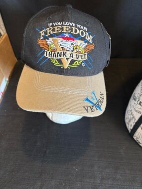 IF YOU LOVE YOUR FREEDOM THANK A VET EMBROIDERED ADJUSTIBLE BASEBALL STYLE CAP